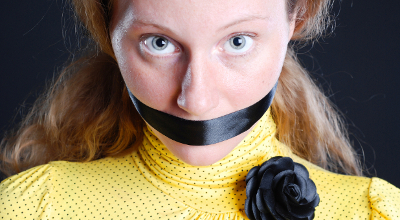 Woman mouth taped shut Woman mouth taped shut