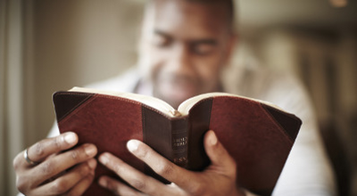 Man holding Bible Man holding Bible