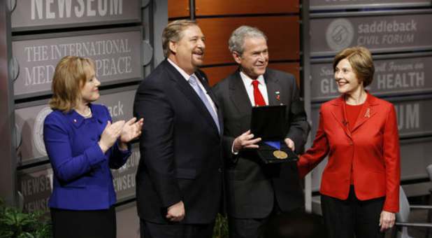 Left to right: Kay Warren and her husband, Rick Warren, with former President George W. Bush and his wife, Laura Bush.